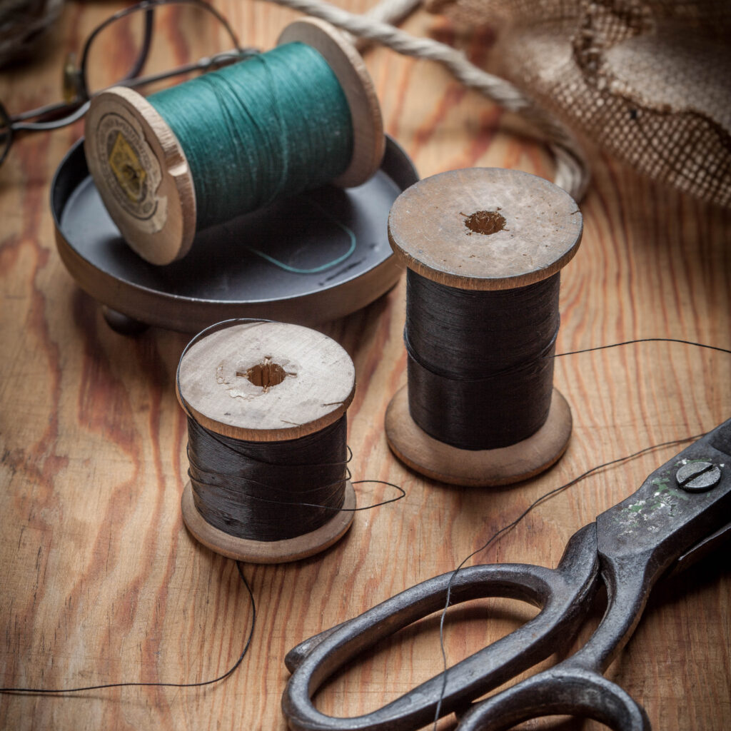 Old sewing kit and supplies.